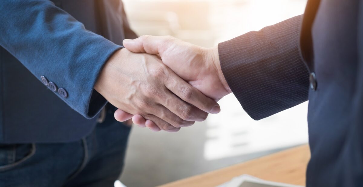 two-confident-business-man-shaking-hands-meeting-office-success-dealing-greeting-partner-concept